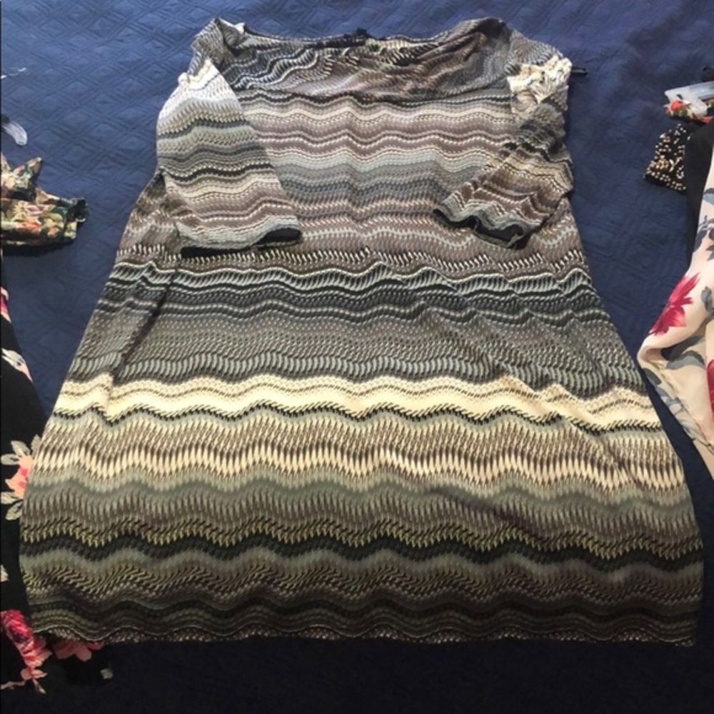 Macy’s dress very very silky and stretchy